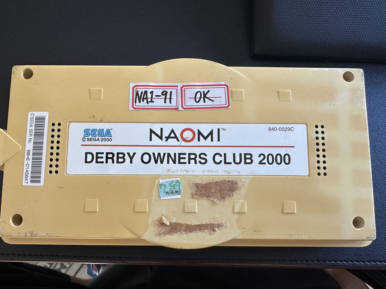 A single Sega NAOMI cartridge for Derby Owners Club 2000.
